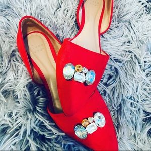 Pointed red flats with jewels